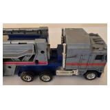 DR - Hot Wheels 25th Anniversary Case with 2 Carrier Trucks and Extra Trailer