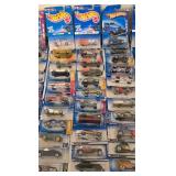 DR - Collection of 77 Unopened Hot Wheels Cars in Original Packaging