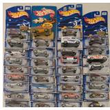 K - Hot Wheels Die-Cast Car Collection with Action Packs and Accessories