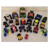 K - Collection of 18 Assorted Toy Monster Trucks and Off-Road Vehicles