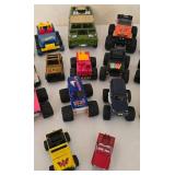 K - Collection of 18 Assorted Toy Monster Trucks and Off-Road Vehicles