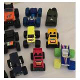 K - Collection of 18 Assorted Toy Monster Trucks and Off-Road Vehicles