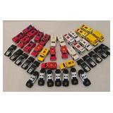 K - Collection of 32 Die-Cast Emergency Vehicles Including Police Cars, Fire Trucks, and Ambulances
