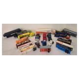 K - Collection of Die-Cast Semi Trucks and Race Cars with Trailers