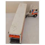 K - Collection of Die-Cast Semi Trucks and Race Cars with Trailers