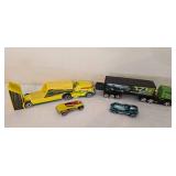 K - Collection of Die-Cast Semi Trucks and Race Cars with Trailers