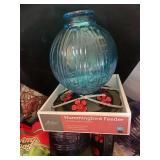 Large Outdoor Planter Pot with Hummingbird Feeders and Garden Decor Assortment