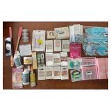 Large Group of Beauty and Personal Care Items including Gel Eye Masks, Fake Nails, and Sprays