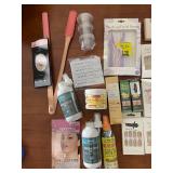 Large Group of Beauty and Personal Care Items including Gel Eye Masks, Fake Nails, and Sprays