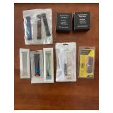 Collection of Apple Watch Bands and Accessories in Packaging