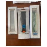 Collection of Apple Watch Bands and Accessories in Packaging