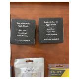 Collection of Apple Watch Bands and Accessories in Packaging