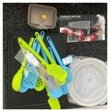 Kitchenware and Organizer Lot with Utensils, Plates, Containers, and Cherry Pitter