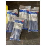 Kitchen and Party Supplies Assortment Including Diapers, Utensils, Cups, and Containers