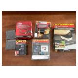 Outdoor Grill Accessories Lot Including Griddle Cleaning Kit, Grill Light, Propane Hose, Airtag Holders, and Bottle Opener Set