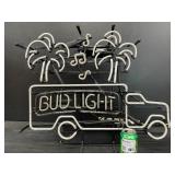 Bud Light beer truck with musical notes and palm trees, neon sign