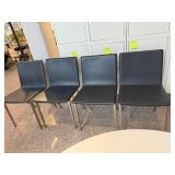 Modern Round Dining Table with 4 Black Chairs