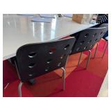 Set of 4 Modern Black Chairs with Circular Cutout Backs