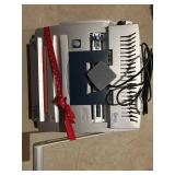 Binding Machines with Assorted Binding Supplies