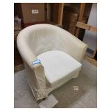 White Barrel Armchair with Red Striped Throw Blanket