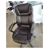 Used Brown Faux Leather Office Chair with Adjustable Armrests