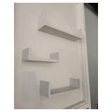 White Wall-Mounted Pegboard Organizer with Shelves and Scissors Holders