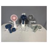 Five Portable, Rechargeable, Hand-held Fans with base for use as desktop fan.  Includes USB Charging Cords