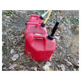 Three Gas Cans - 1 Gallon, 2 Gallon and 2 Gallon Cans