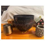 Four Unique Flower and Plant Containers with a Decorative Birdhouse