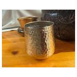 Four Unique Flower and Plant Containers with a Decorative Birdhouse