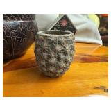 Four Unique Flower and Plant Containers with a Decorative Birdhouse