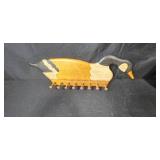 Decorative Collectibles Lot with Denver Broncos Sign, Wood Goose Rack, Arizona Piggy Bank, Miniature Cactus, and Shadow Box