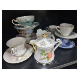 Set of Vintage Porcelain Teacups and Saucers with Sugar Bowl