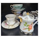 Set of Vintage Porcelain Teacups and Saucers with Sugar Bowl