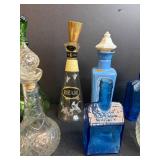 Collection of Vintage Glass Decanters and Bottles Assorted Colors and Styles