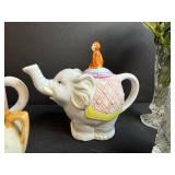 Collection of Assorted Decorative Figurines and Teapots