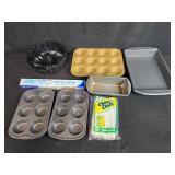 Assorted Bakeware Collection with Pans, Muffin Tins, Cheesecloth, and Baking Paper