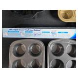 Assorted Bakeware Collection with Pans, Muffin Tins, Cheesecloth, and Baking Paper