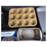Assorted Bakeware Collection with Pans, Muffin Tins, Cheesecloth, and Baking Paper