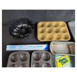 Assorted Bakeware Collection with Pans, Muffin Tins, Cheesecloth, and Baking Paper