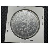 1884 Morgan Silver Dollar Marked AU55 When Purchased