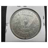 1885 Morgan Silver Dollar Marked AU58 When Purchased