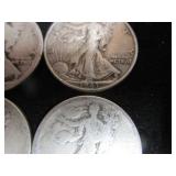 Four Walking Liberty Half Dollars