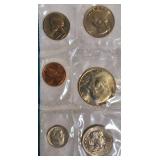 1979 Uncirculated Set from the Philadelphia and Denver Mints, which includes a dollar coin.