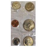 1979 Uncirculated Set from the Philadelphia and Denver Mints, which includes a dollar coin.