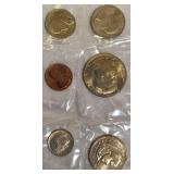 1979 Uncirculated Set from the Philadelphia and Denver Mints, which includes a dollar coin.