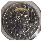 This lot is in A/U condition and includes 1958 Lincoln pennies, early 1960s quarters, and 1979-S Susan B. Anthony dollars.