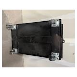 (2) black Uline Heavy Duty floor dolly. Both 40” L x 24” W