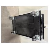 (2) black Uline Heavy Duty floor dolly. Both 40” L x 24” W