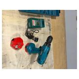 Makita 6233D cordless 3/8" driver drill with 1422 battery and DC1410 charger in case